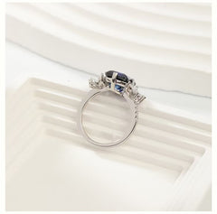 "Fashionable Personality Square Ring, S925 Silver Plated with 18K Gold, European and American Retro Simulated Sapphire Engagement Ring." Main Stone:9*11mm. Main Stone Material: Cultivated Sapphire. Secondary Stone Material:5A Zircon